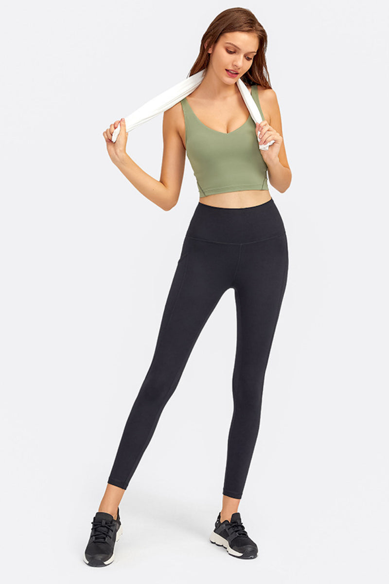 Enhance Your Workout Style with the Deep V-Neck Crop Sports Bra at Burkesgarb