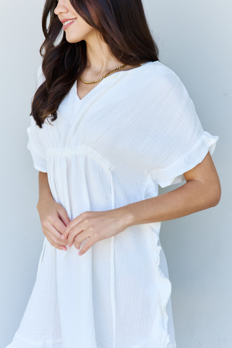 Embrace Effortless Elegance with our White Ruffle Hem Dress