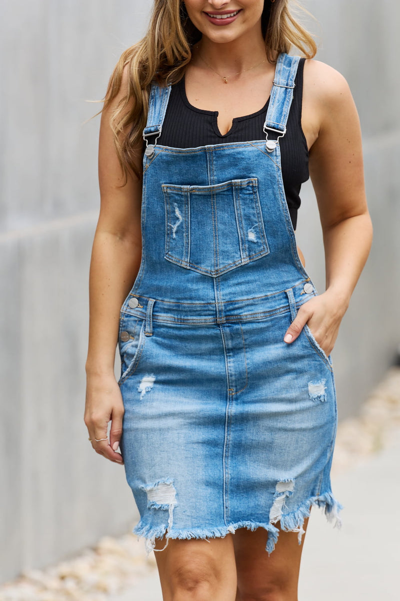 Embrace Casual Chic with the Denim Overall Mini Dress at Burkesgarb