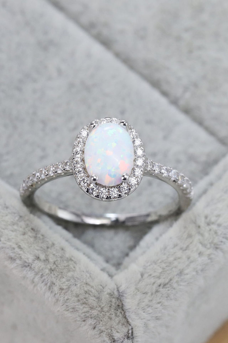 Ethereal Opulence: Opal 925 Sterling Silver Halo Ring at Burkesgarb