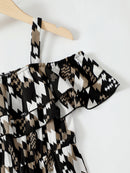 Stand out with Style in the Cold-Shoulder Flare Leg Jumpsuit from Burkesgarb