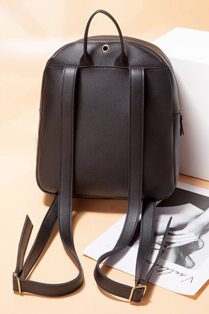 Make a Statement with the Burkesgarb Studded Leather Backpack