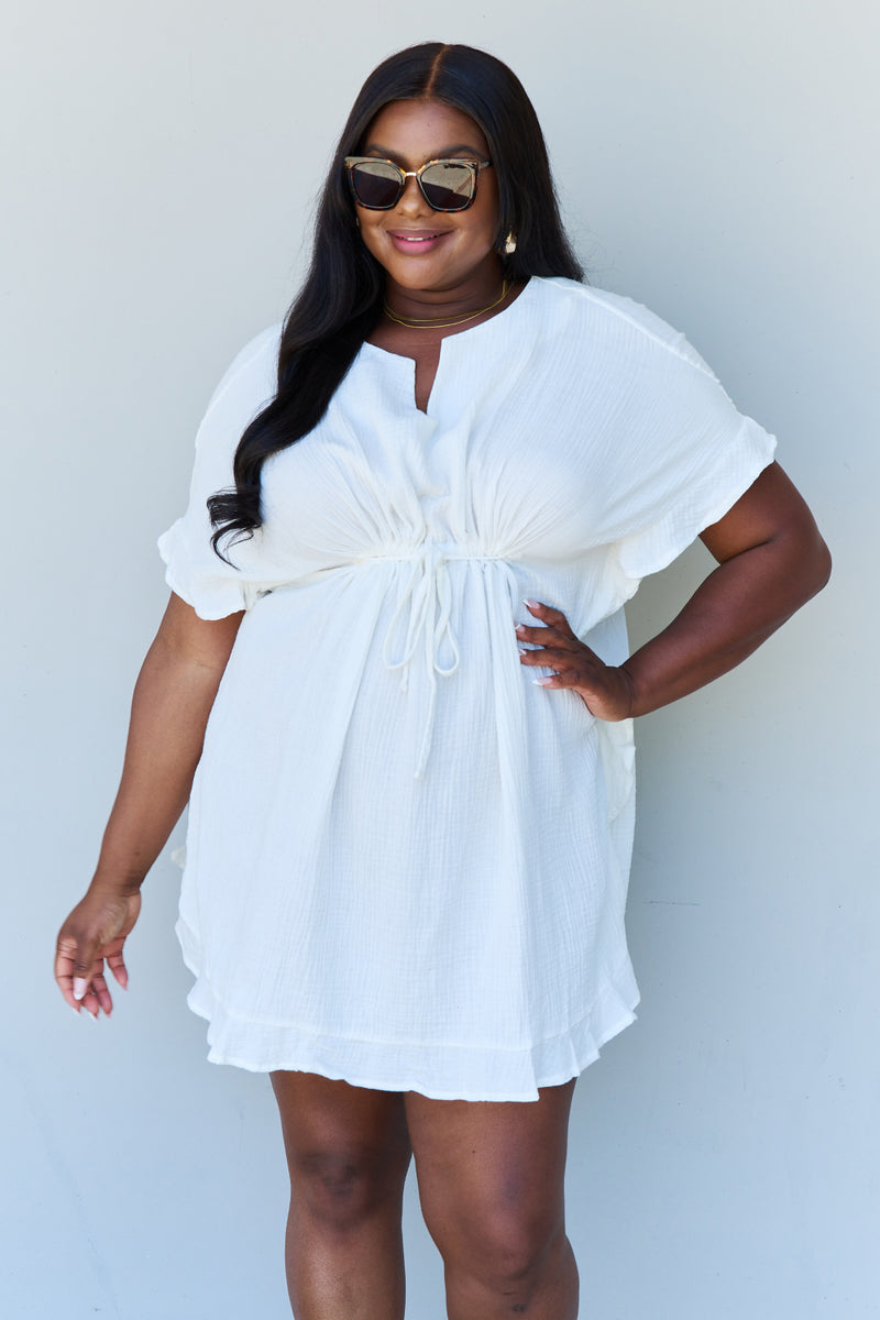 Embrace Effortless Elegance with our White Ruffle Hem Dress