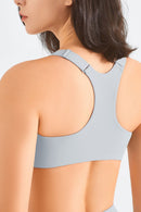 Stay Comfy and Supported with the Zip-Up Racerback Sports Bra at Burkesgarb