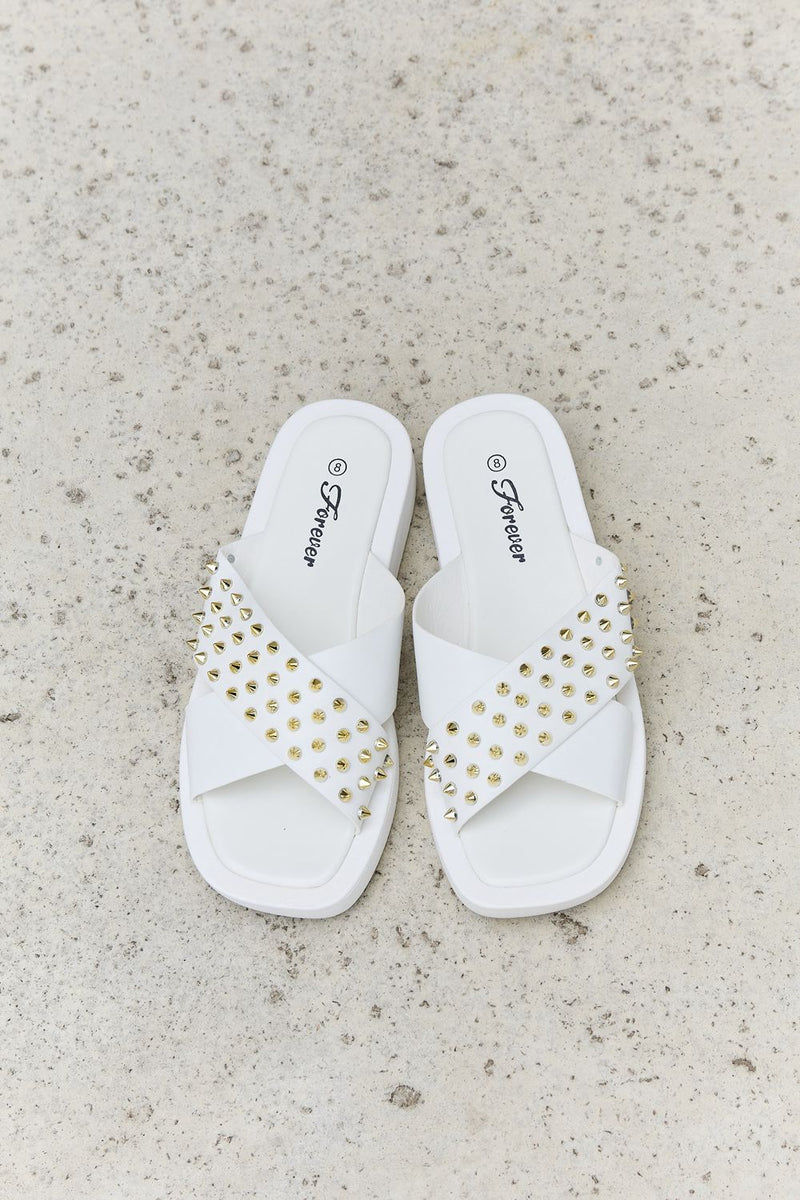 "Edgy and Chic: White Studded Cross Strap Sandals by Burkesgarb | Stylish and Comfortable Women's Footwear"