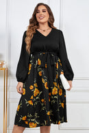 Elegance in Bloom: Plus Size Floral Print Midi Dress with Tie Belt