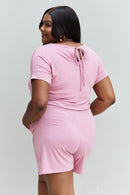 "Effortless Charm: Light Carnation Pink Short Sleeve Romper by Burkesgarb | Stylish and Comfortable Women's Outfit"