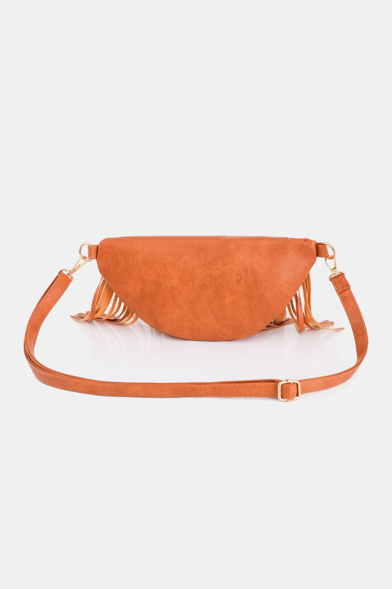 Add a Touch of Boho Chic to Your Outfits with the Fringed Leather Sling Bag at Burkesgarb