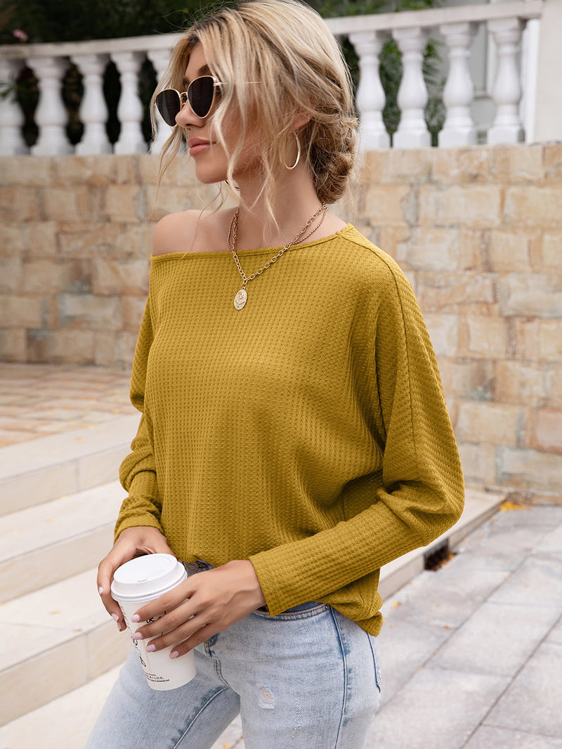 Stay Cozy and Chic with the Waffle-Knit Boat Neck Long Sleeve Top at Burkesgarb