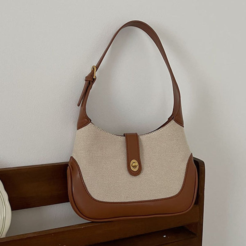 Make a Bold Statement with the Contrast Canvas Shoulder Bag at Burkesgarb