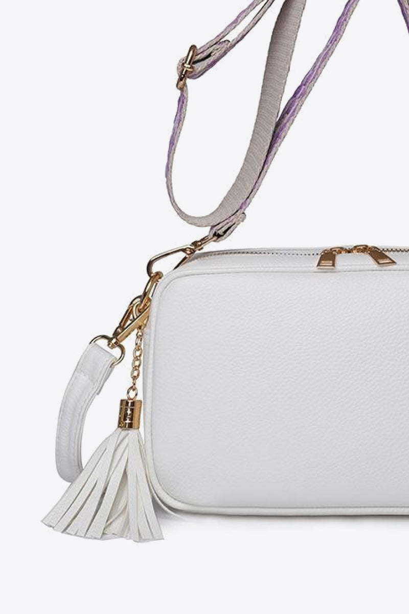 Chic and Stylish: Leather Tassel Crossbody Bag at Burkesgarb