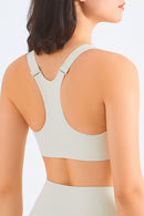 Stay Comfy and Supported with the Zip-Up Racerback Sports Bra at Burkesgarb