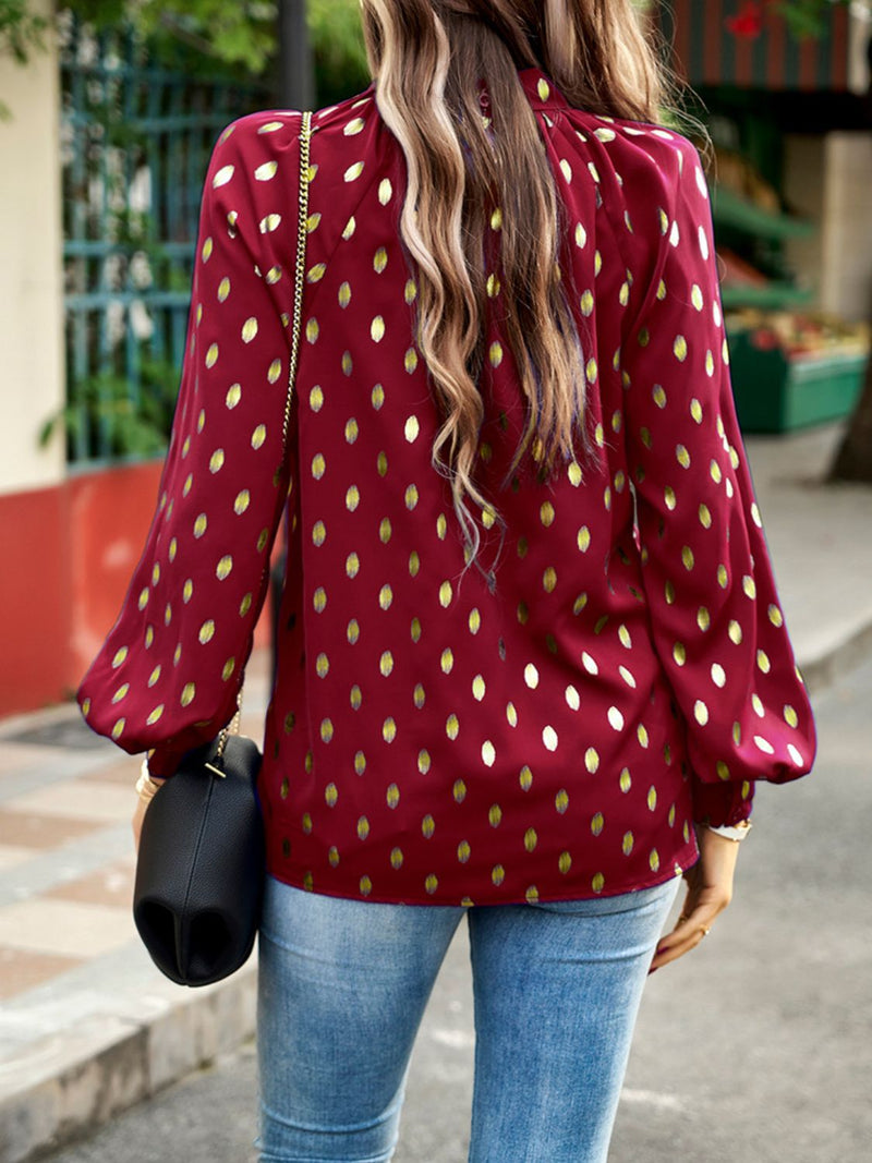 Elegant and Trendy: Mock Neck Cutout Lantern Sleeve Blouse at Burkegarb