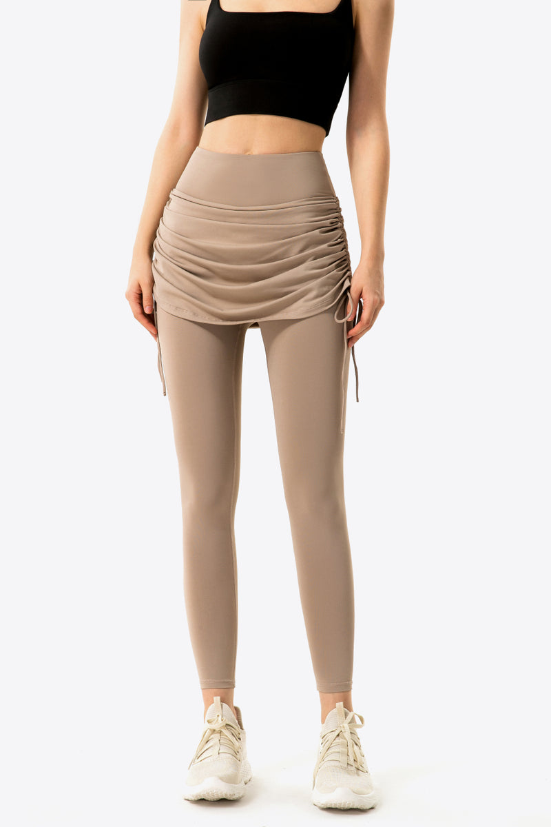 Elevate Your Wardrobe with Drawstring Ruched Faux Layered Yoga Leggings at Burkesgarb