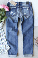 Embrace Effortlessly Cool Style with Distressed Straight Leg Jeans