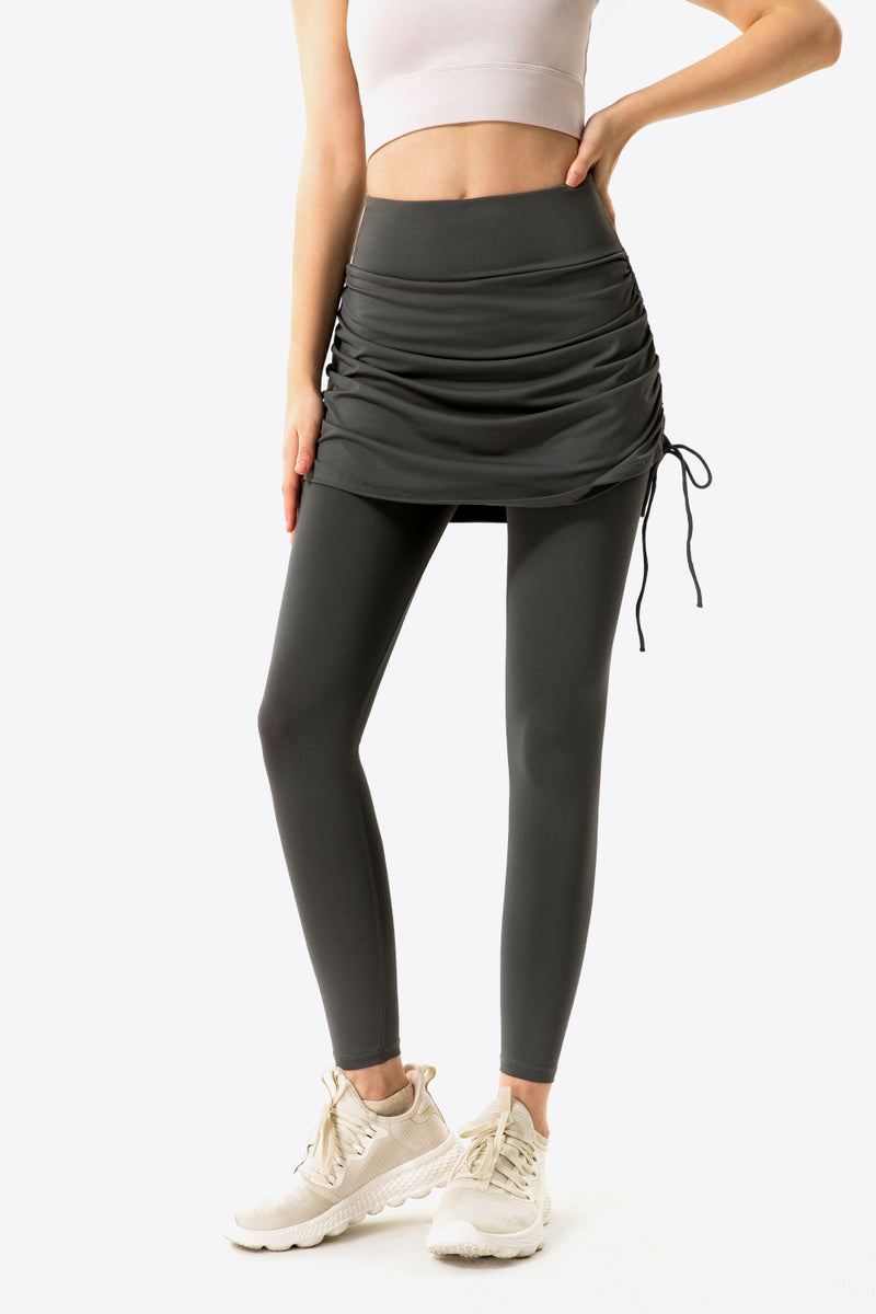 Elevate Your Wardrobe with Drawstring Ruched Faux Layered Yoga Leggings at Burkesgarb
