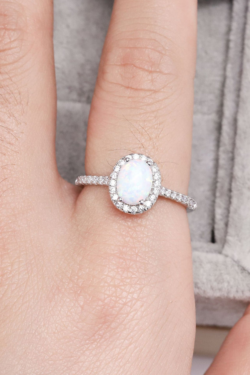 Ethereal Opulence: Opal 925 Sterling Silver Halo Ring at Burkesgarb