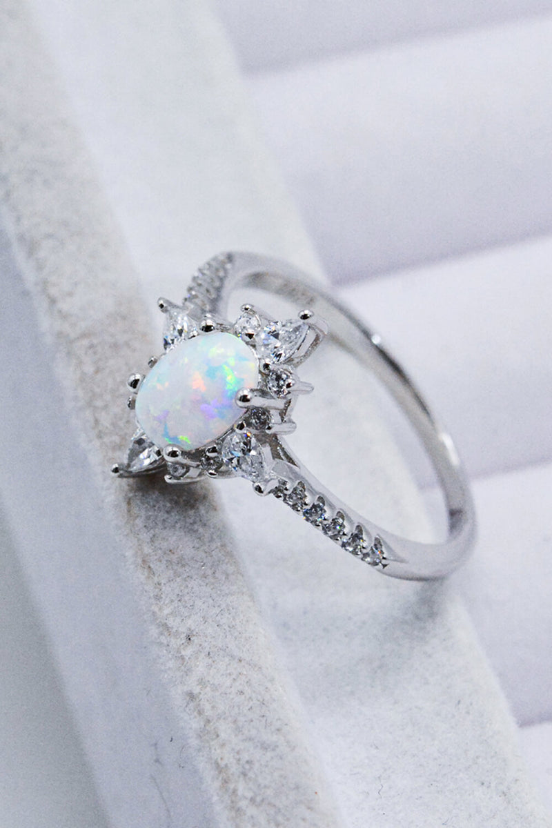 Radiant Beauty: Platinum-Plated Opal and Zircon Ring at Burkesgarb