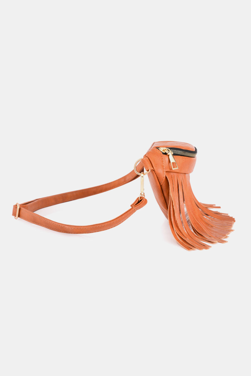 Add a Touch of Boho Chic to Your Outfits with the Fringed Leather Sling Bag at Burkesgarb