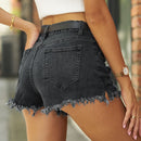 Effortlessly Chic: Raw Hem Distressed Denim Shorts at Burkesgarb