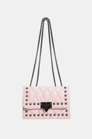 "Edgy and Chic: Studded Leather Crossbody Bag at Burkesgarb