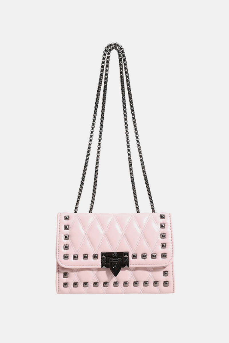 "Edgy and Chic: Studded Leather Crossbody Bag at Burkesgarb